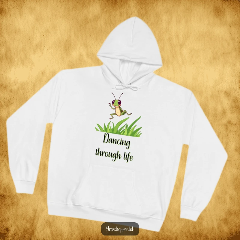 Funny grasshopper character dances energetically on a blade of grass on this hoodie, a cozy funny gift.