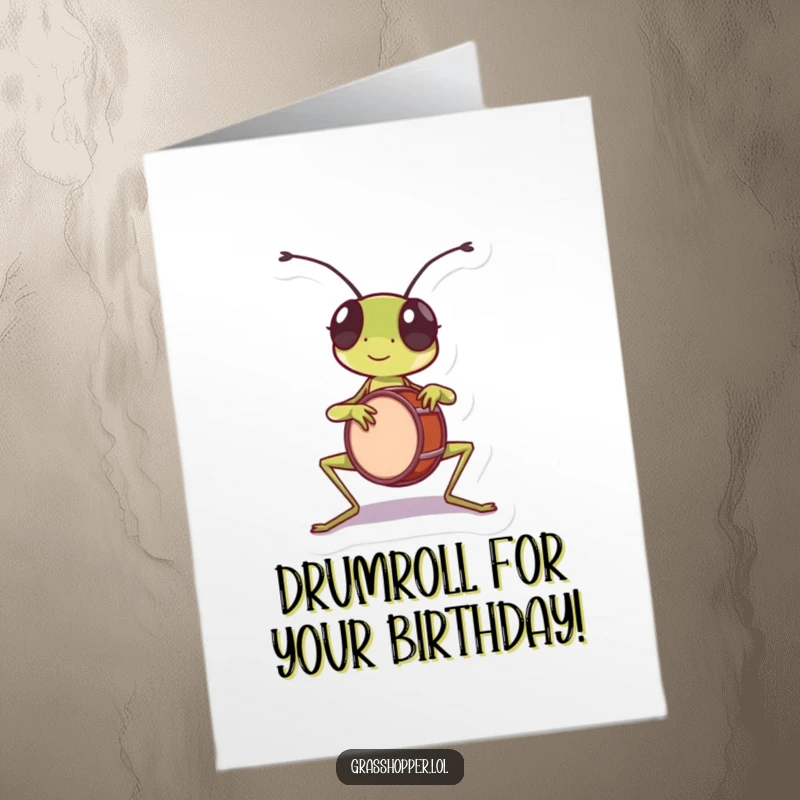 Funny Free Printable Birthday Card: Grasshopper playing a tiny drum with its front legs. Energetic and festive greeting.