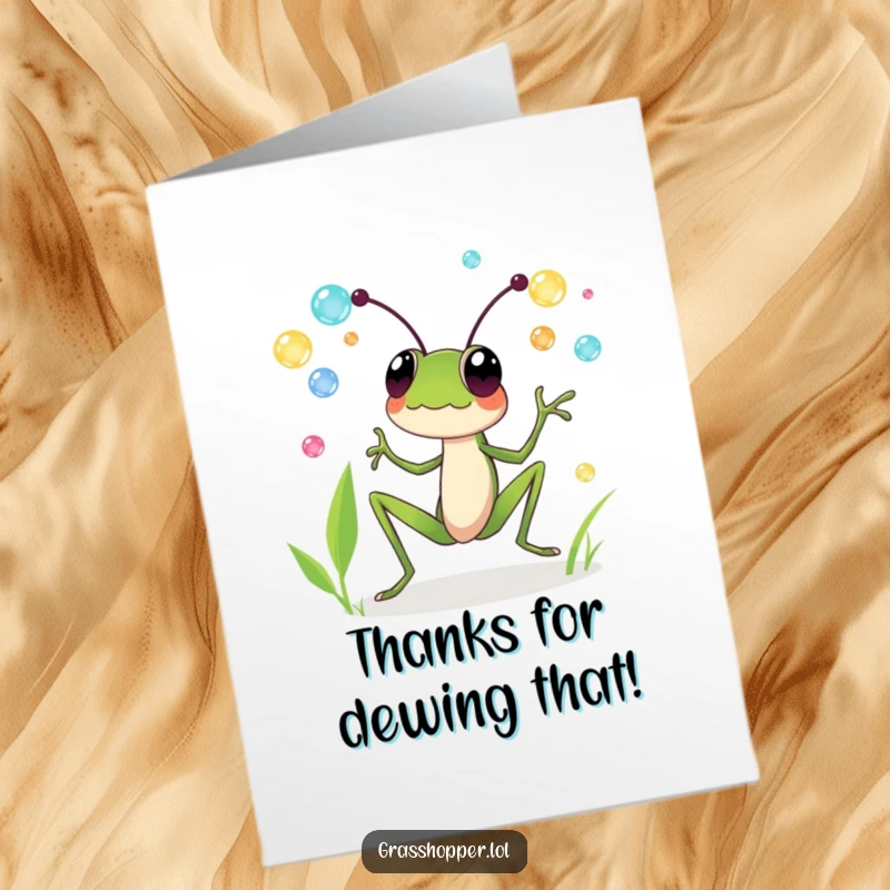 Funny Free Printable Thank You Card: A grasshopper joyfully juggles colorful dewdrops, showering appreciation with a delighted expression.