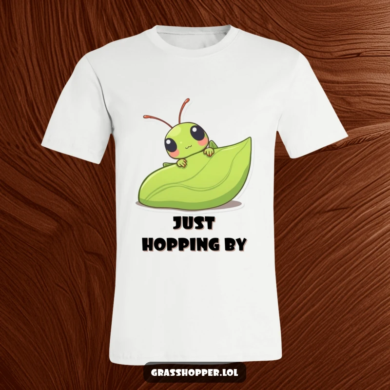 Funny kawaii grasshopper peeking shyly from behind a large green leaf, printed on a comfortable t-shirt.