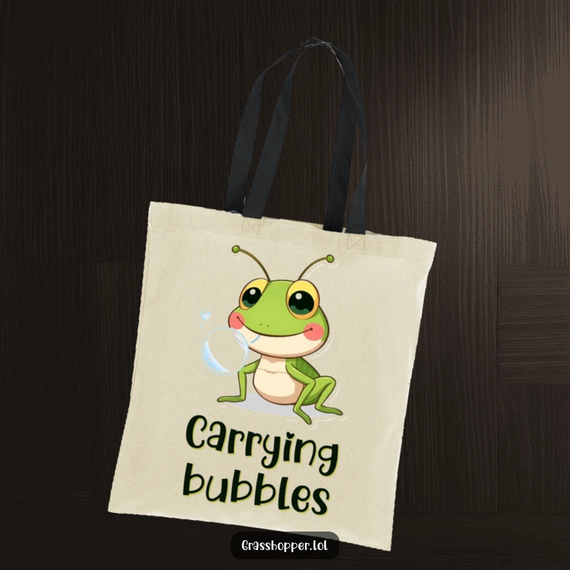 Funny grasshopper with a wide grin, blowing a shiny bubble, printed on a tote bag for a cheerful accessory.