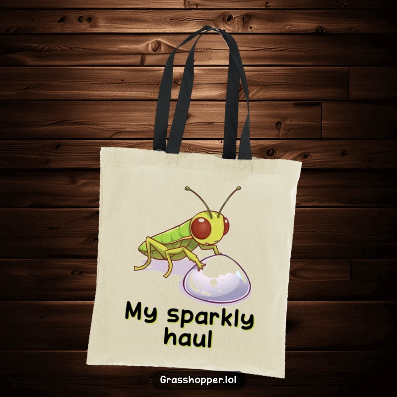 Funny Grasshopper Tote Bag showing a curious insect examining a shiny pebble, ideal for shopping and carrying treasures.